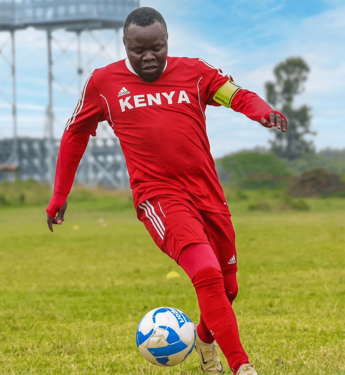 Grassroots football in Migori County. Senator Eddy Oketch playing football with local youth.
